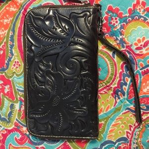Patricia Nash Etched Leather Black Wallet with cell pocket in the center